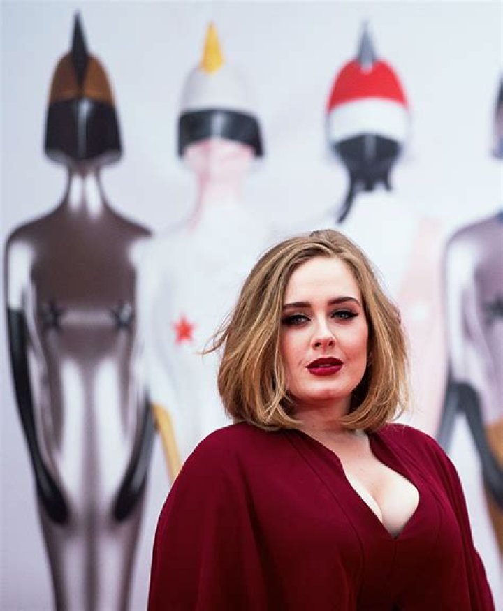 Adele Stuns In Bejeweled Mini Dress & Gets Goofy While Celebrating Upcoming Album Release