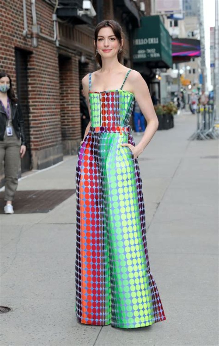 Anne Hathaway Rocks Eye-Popping Neon Jumpsuit With Matching Jacket On ‘The Late Show’