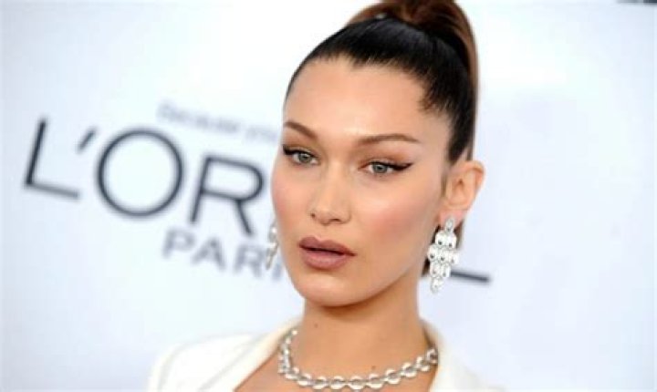 Bella Hadid Sunbathes In Animal Print Bikini At The Beach In Miami