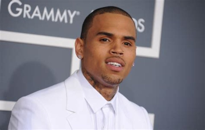 Chris Brown Snuggles Daughter, Lovely, 11 Months, In Rare Photo Together
