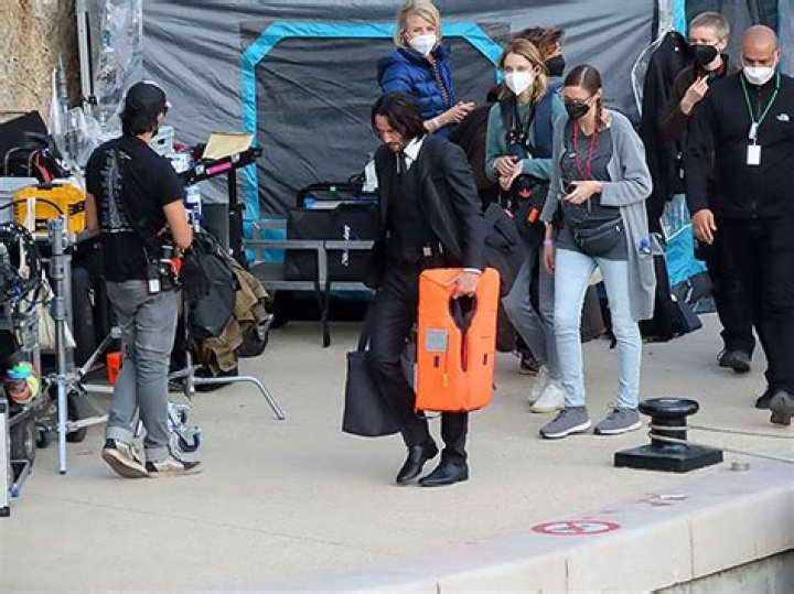 Keanu Reeves, 57, Helps Move Equipment On ‘John Wick 4’ Set — Photo