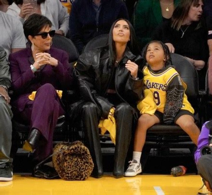 Khloe Kardashian & Ex Brother-in-Law Kanye West Share Hug at Nephew Saint’s Basketball Game: Photos