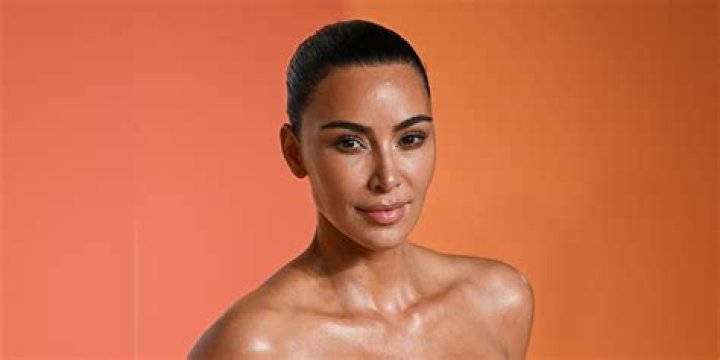 Kim Kardashian Puts Super Skimpy Thong On Full Display As She Kneels Down In Tight Skirt