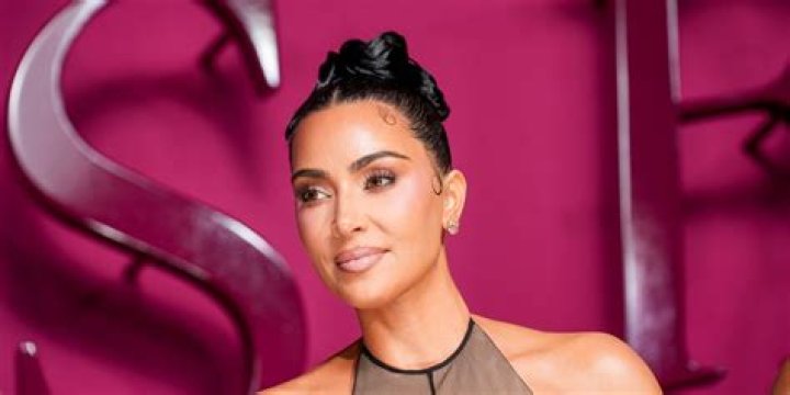 Kim Kardashian Stuns In Strapless Purple Bustier & Form-Fitting Leather Pants In Insta Pic