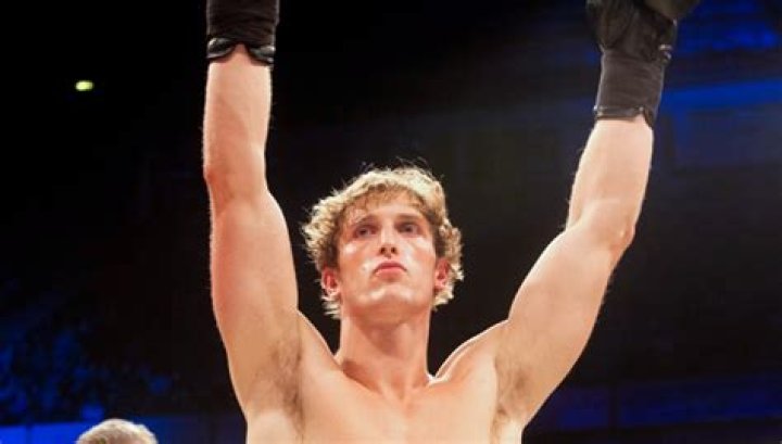 Logan Paul Slaps A Man Unconscious & Then Smiles & Flexes For The Camera