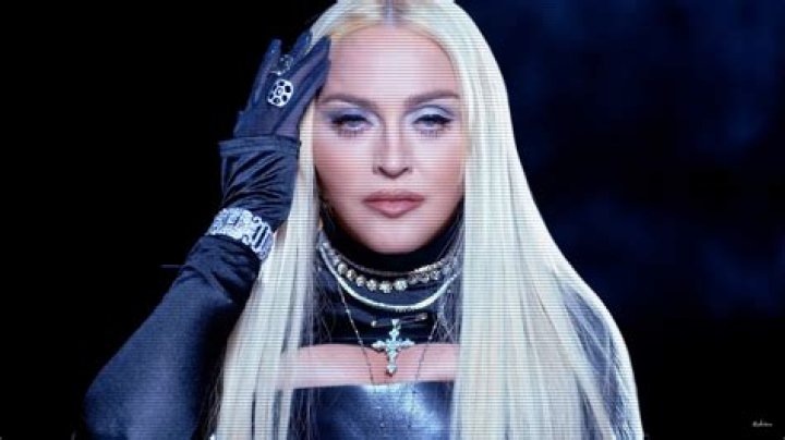 Madonna Rocks Leather Corset As She Guzzles Wine To Promote Her ‘Frozen’ Remix Video: Watch