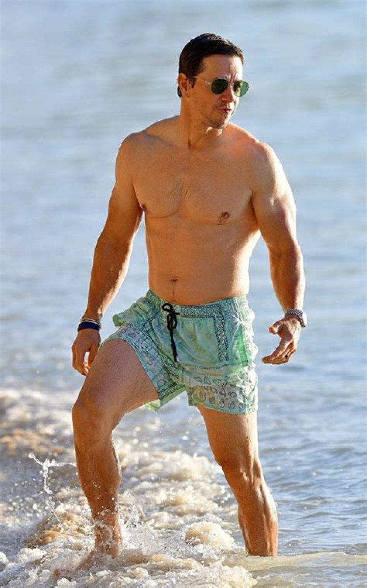 Mark Wahlberg Goes Shirtless & Hugs Daughter Grace, 12, While Swimming In Barbados: Photos