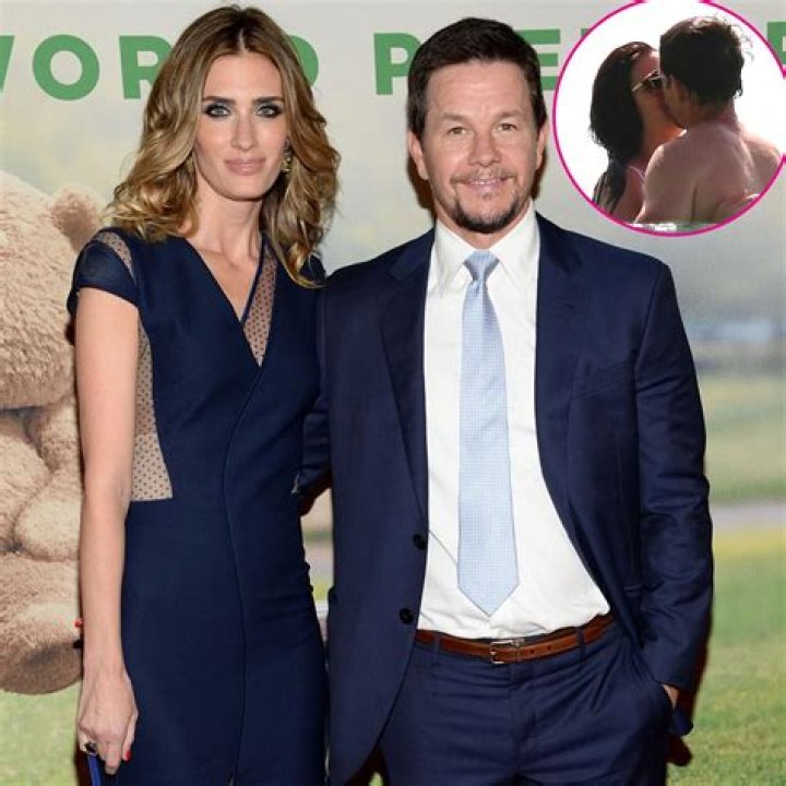 Mark Wahlberg’s Wife Rhea Durham Enjoys A Swim In Tie-Dye Swimsuit On Romantic Barbados Vacay