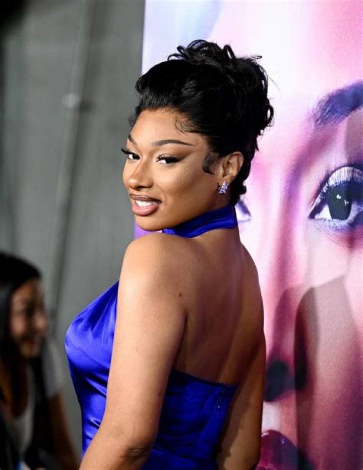 Megan Thee Stallion Stuns In Cutout Rainbow Jumpsuit To Show Off Her ‘Natural’ Figure: Watch