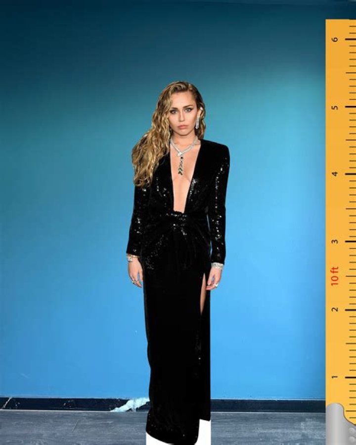 Miley Cyrus Rocks Cutout Swimsuit For Sexy Tanning Campaign: Photo – Hollywood Life