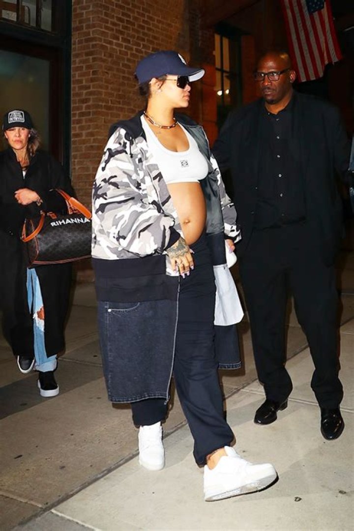 Rihanna Puts Bare Baby Bump On Display In Crop Top & Camo Jacket Ahead Of Baby No. 2